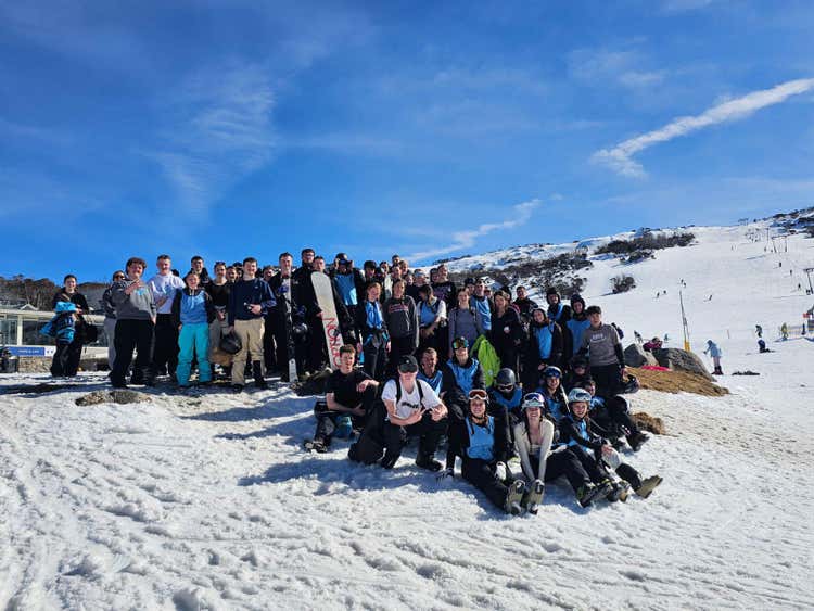 May be an image of 6 people and people skiing